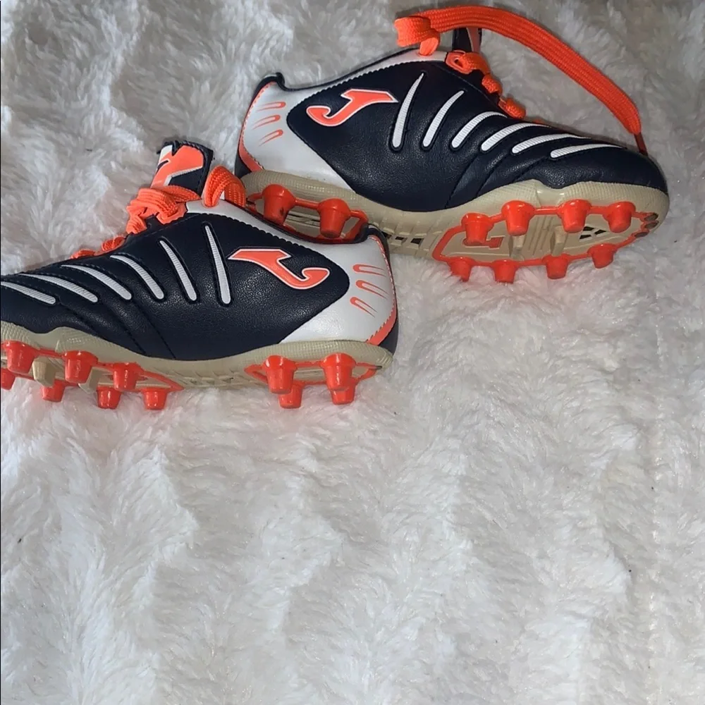 Kids Black and Orange Soccer Shoes like new